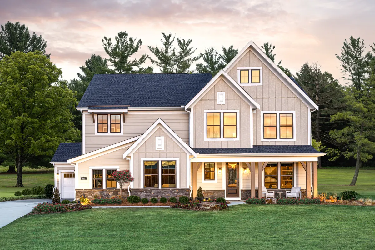 Illustrative photo, not this property: a modern farmhouse-style home at dusk