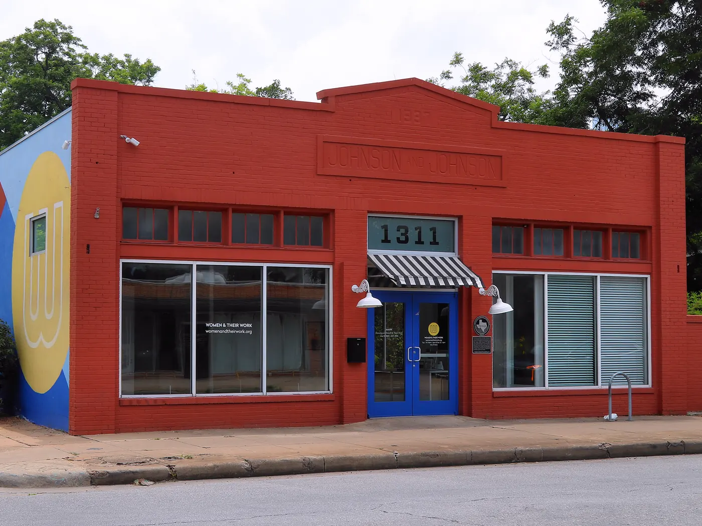The red-brick Johnson & Johnson Grocery building, a historic landmark in East Austin